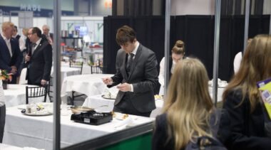 Young person competing in Restaurant Service competition