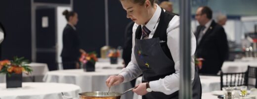 Young person competing in Restaurant Service competition