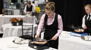 Young person competing in Restaurant Service competition