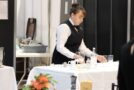 Young person competing in Restaurant Service competition