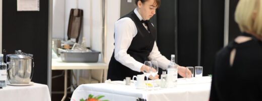 Young person competing in Restaurant Service competition