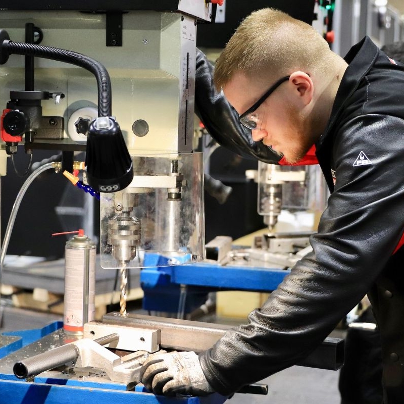 Young person competing in Sheet Metalwork Technology competition