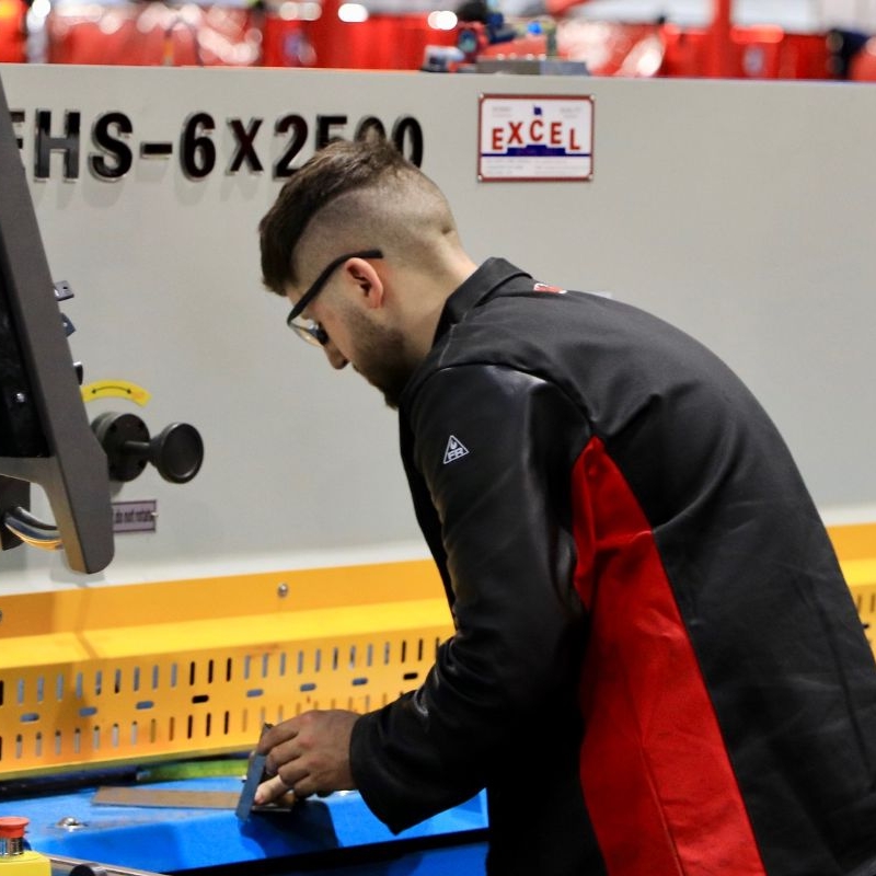 Young person competing in Sheet Metalwork Technology competition