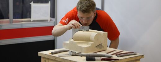 Young person competing in Stonemasonry competition