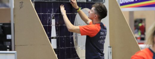 Young person competing in Wall and Floor Tiling competition