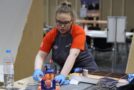 Young person competing in Wall and Floor Tiling competition