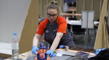 Young person competing in Wall and Floor Tiling competition