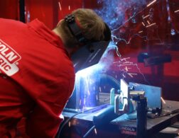 Young person competing in Welding competition