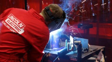 Young person competing in Welding competition