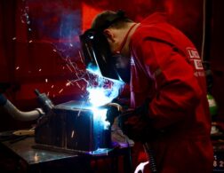 Young person competing in Welding competition