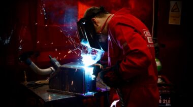 Young person competing in Welding competition