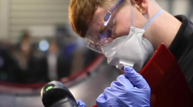 Young person competing in Automotive Body Repair competition