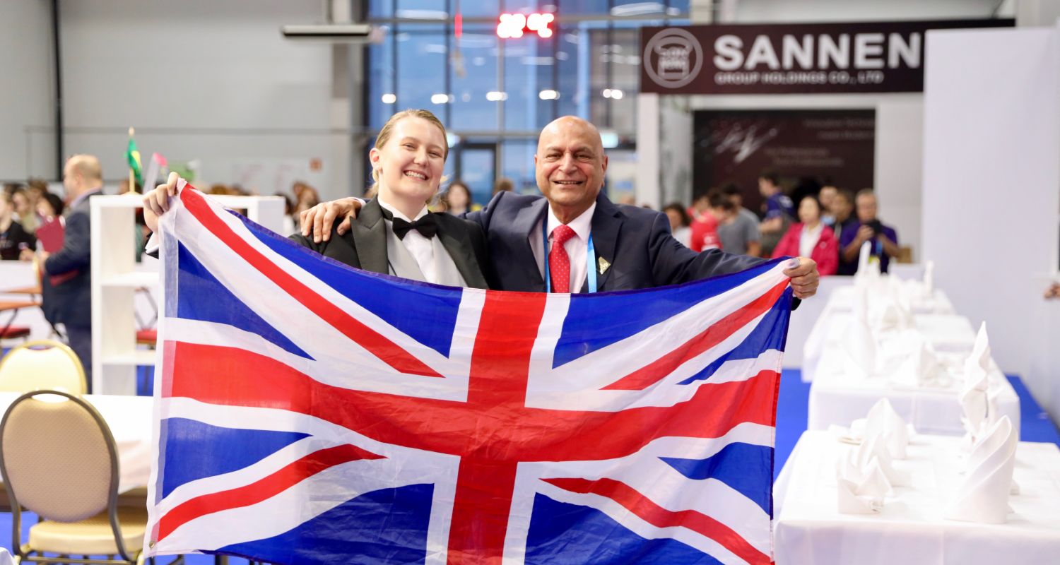 Photo of Collette competing internationally in Restaurant Service Competition