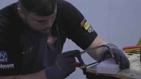 Young person competing in Electrical Installation competition