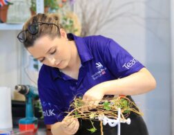Photo of Elizabeth competing internationally in the Floristry Competition