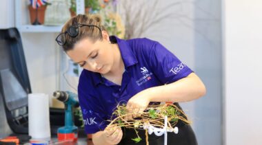 Photo of Elizabeth competing internationally in the Floristry Competition