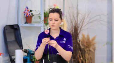 Photo of Elizabeth competing internationally in the Floristry Competition