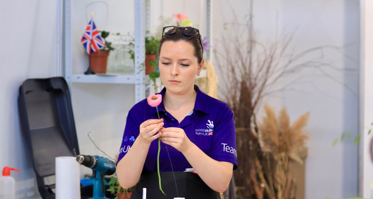 Photo of Elizabeth competing internationally in the Floristry Competition