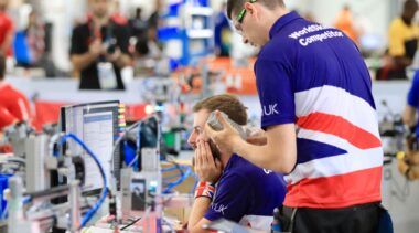 Photo of Jack and Danny competing internationally in the Mechatronics Competition