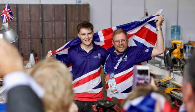 Photo of Owen competing internationally in the cabinet making competition