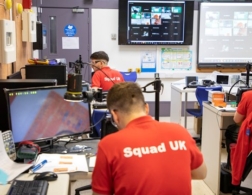 group of young people in electronics class
