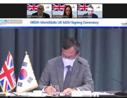 Signing of agreement by HRDKorea