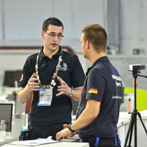 Mark speaking to German competitor