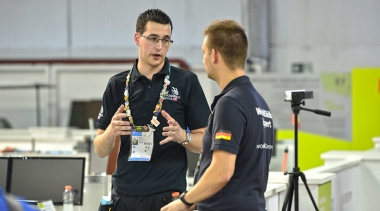 Mark speaking to German competitor