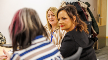 Image of three female endorsed trainers in conversation